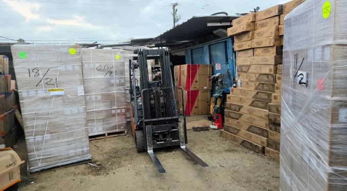 “$1.4 Million Loot Stash Busted: Cops Find Computers, Cars, Guns, and Even Meth in LA Warehouse”